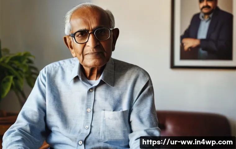 장수와 관련된 생리학적 변화 - An elderly South Asian man wearing comfortable traditional clothing and glasses, sitting peacefully ...